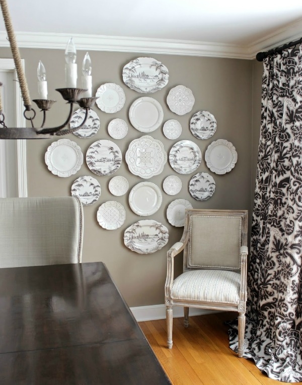 hanging plates on wall dining room with table.jpg